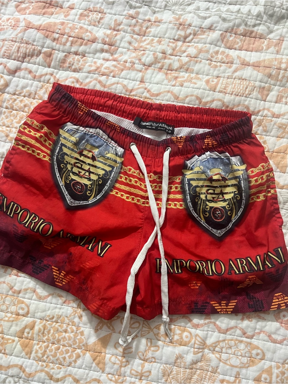 Emporio Armani Red Swim Trunks with Gold Crest Print